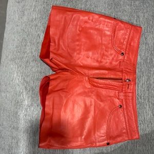 Red leather shorts